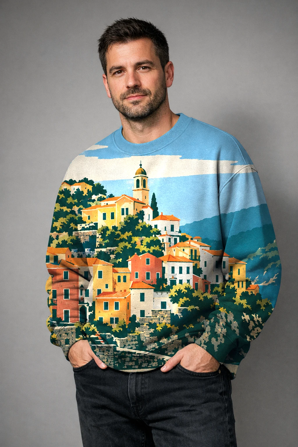 A man in a crewneck sweatshirt printed edge to edge with the Park Service 1939 harbour, hands in his pockets